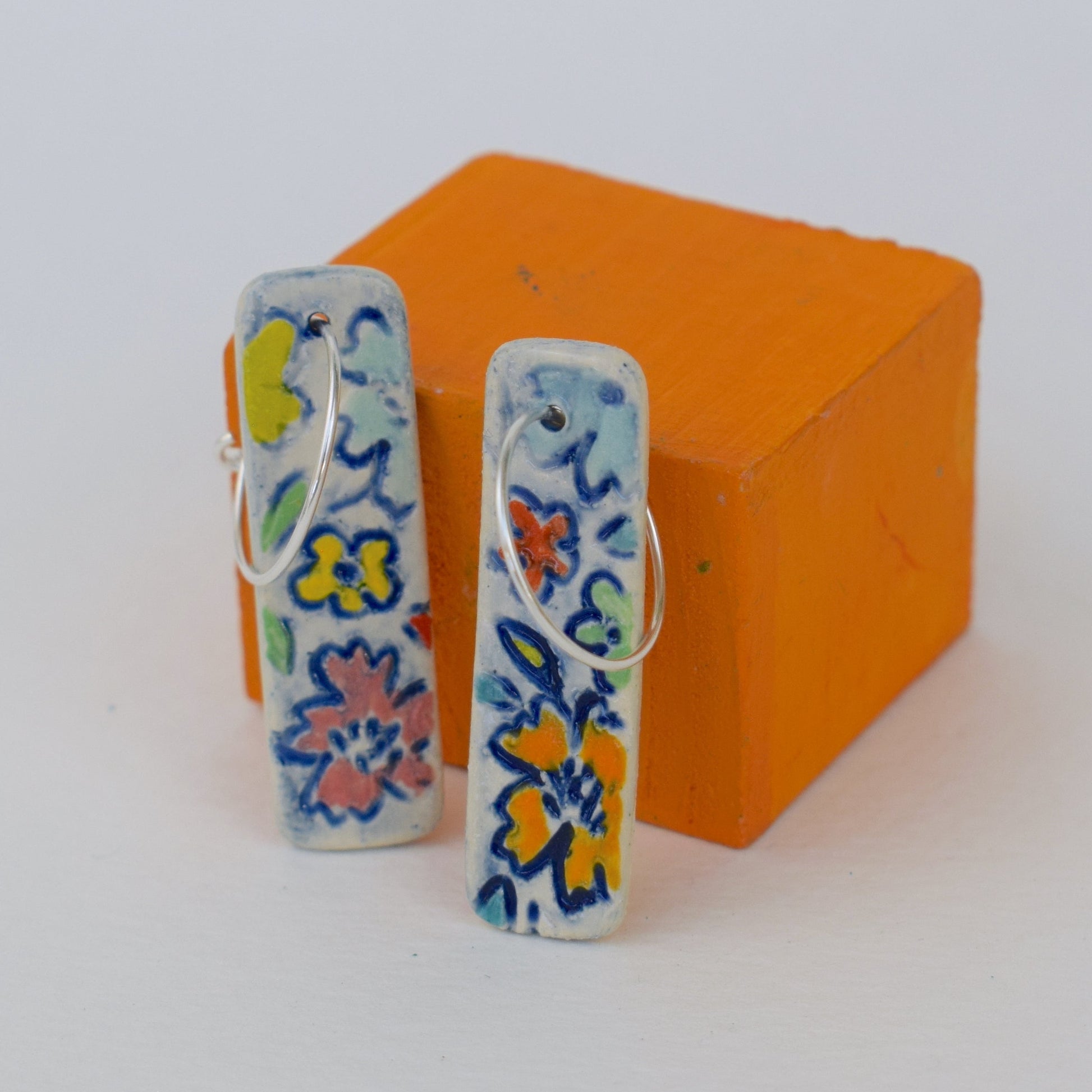  floral-patterned earrings 
